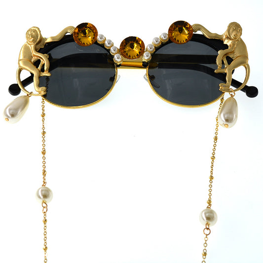 European and American exaggerated female trend board carved monkey pearl crystal sunglasses European station front cool sunglasses