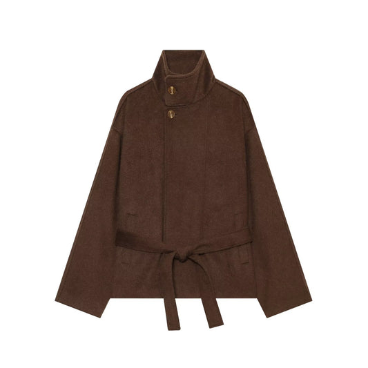 Wearing a long sleeved woolen jacket with a belt for women