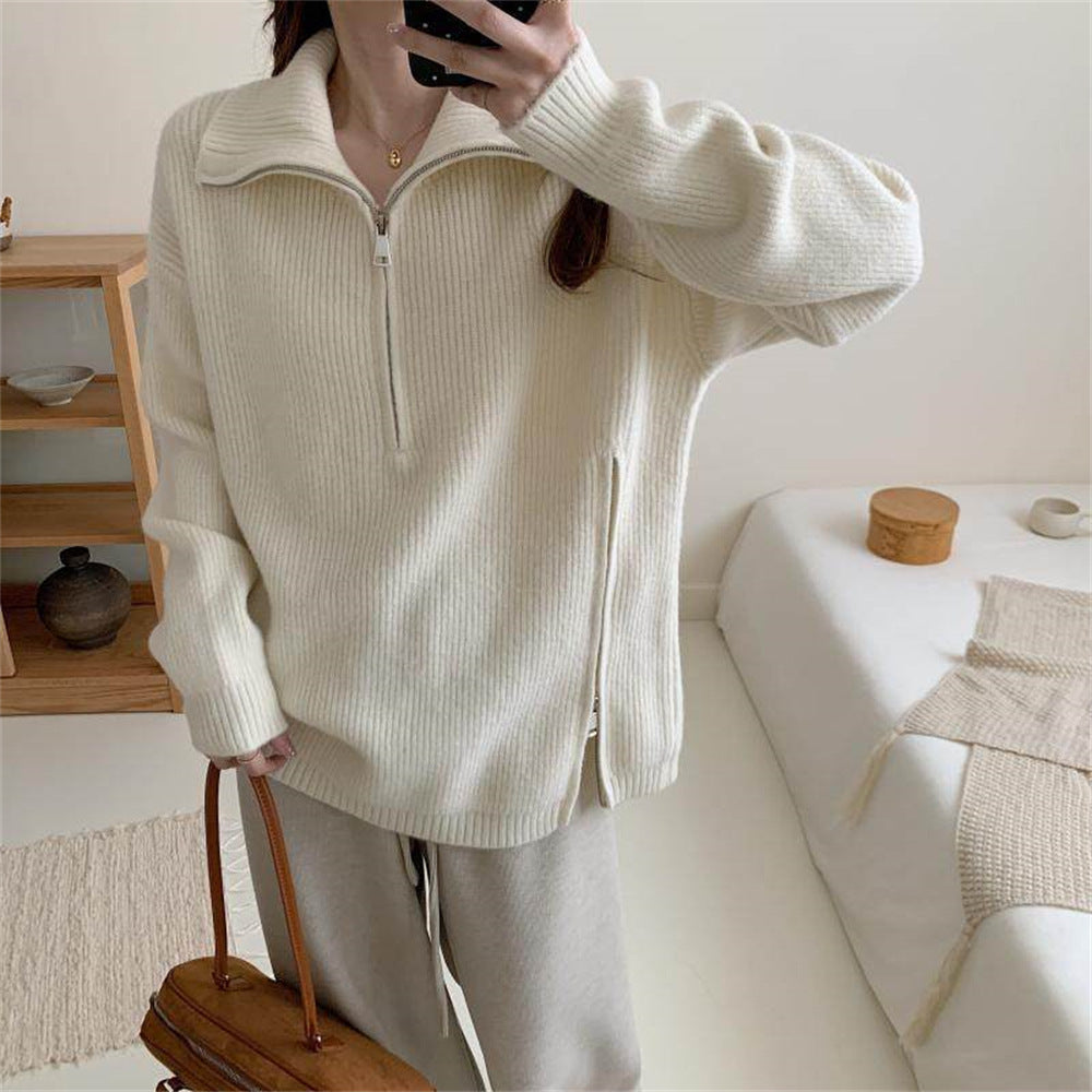 Loose long sleeved sweater with slit hem